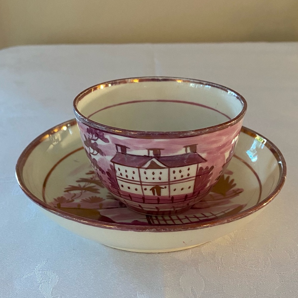 Antique early 19th century English Regency pink luster tea cup and saucer